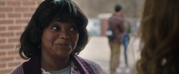 Movie still from “Ma” (2019), directed by Tate Taylor – A person wearing a sweater; Close Up shot, Over the shoulder angle