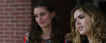 Movie still from “Ma” (2019), directed by Tate Taylor – Two young women sitting next to each other; Close Up shot, Over the shoulder angle