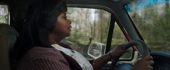 Movie still from “Ma” (2019), directed by Tate Taylor – A woman sitting in the driver's seat of a car; Close Up shot, Over the shoulder angle
