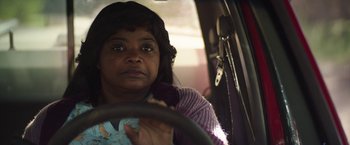 Movie still from “Ma” (2019), directed by Tate Taylor – A woman sitting in the driver's seat of a vehicle; Close Up shot, Over the shoulder angle