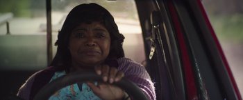 Movie still from “Ma” (2019), directed by Tate Taylor – A woman sitting in the driver's seat of a car; Close Up shot, Over the shoulder angle