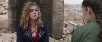 Movie still from “Ma” (2019), directed by Tate Taylor – A woman standing in front of a pile of rubble; Close Up shot, Over the shoulder angle