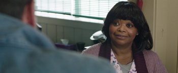 Movie still from “Ma” (2019), directed by Tate Taylor – A person sitting at a table; Close Up shot, Over the shoulder angle