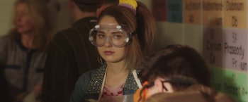 Movie still from “Ma” (2019), directed by Tate Taylor – A woman wearing a pair of goggles and a jacket; Close Up shot, Over the shoulder angle