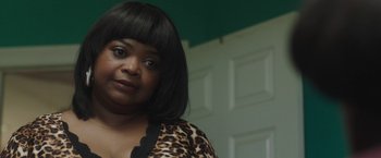 Movie still from “Ma” (2019), directed by Tate Taylor – A person wearing a leopard print shirt; Close Up shot, Over the shoulder angle