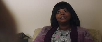 Movie still from “Ma” (2019), directed by Tate Taylor – A person sitting in a chair; Close Up shot, Over the shoulder angle