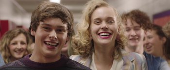 Movie still from “Ma” (2019), directed by Tate Taylor – A man and a woman smiling for the camera; Close Up shot, Low angle