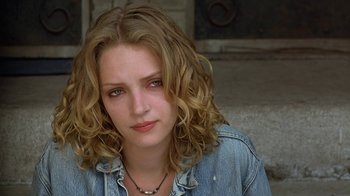 Movie still from “Mad Dog and Glory” (1993), directed by John McNaughton – A person wearing a jean jacket; Close Up shot, Low angle