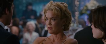 Movie still from “Made of Honor” (2008), directed by Paul Weiland – A person with short blonde hair; Close Up shot, Over the shoulder angle