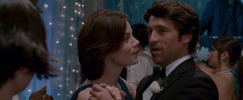 Movie still from “Made of Honor” (2008), directed by Paul Weiland – A man and a woman in formal wear looking at one another; Close Up shot, Over the shoulder angle