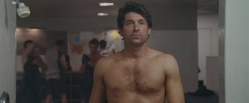 Movie still from “Made of Honor” (2008), directed by Paul Weiland – A man with no shirt is standing in a room; Close Up shot, Over the shoulder angle