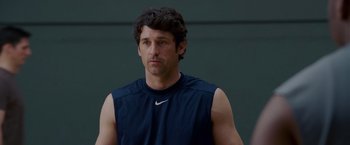 Movie still from “Made of Honor” (2008), directed by Paul Weiland – A male tennis player in a blue shirt; Close Up shot, Over the shoulder angle