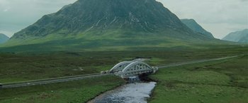 Movie still from “Made of Honor” (2008), directed by Paul Weiland – A bridge over a river with a mountain in the background; Extreme Wide shot, High angle