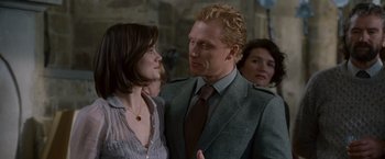 Movie still from “Made of Honor” (2008), directed by Paul Weiland – A man and a woman standing next to each other; Medium shot, Over the shoulder angle