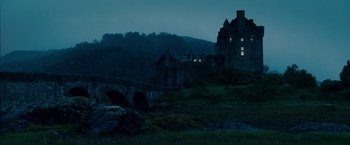 Movie still from “Made of Honor” (2008), directed by Paul Weiland – A castle is lit up at night in the dark; Extreme Wide shot, Low angle