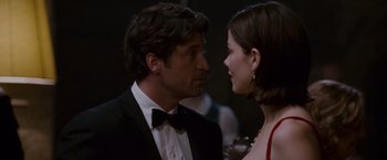 Movie still from “Made of Honor” (2008), directed by Paul Weiland – A man and a woman in formal wear looking at one another; Close Up shot, Over the shoulder angle