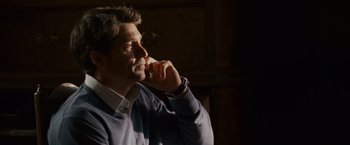 Movie still from “Made of Honor” (2008), directed by Paul Weiland – A man in a blue shirt is talking on a cell phone; Close Up shot, Over the shoulder angle