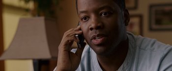 Movie still from “Made of Honor” (2008), directed by Paul Weiland – A person talking on a cell phone; Close Up shot, High angle