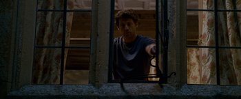 Movie still from “Made of Honor” (2008), directed by Paul Weiland – A man standing in front of an open window; Medium shot, Over the shoulder angle