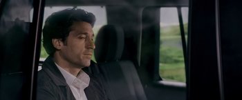 Movie still from “Made of Honor” (2008), directed by Paul Weiland – A man sitting in the back seat of a car; Close Up shot, Over the shoulder angle