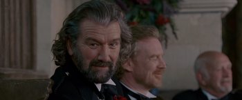Movie still from “Made of Honor” (2008), directed by Paul Weiland – A man with a long beard and a man with a red beard; Close Up shot, Over the shoulder angle