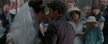 Movie still from “Made of Honor” (2008), directed by Paul Weiland – A man and a woman kissing in front of a group of people; Close Up shot, Over the shoulder angle