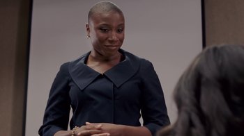 Movie still from “Madea Goes to Jail” (2009), directed by Tyler Perry – A woman in a black dress talking to someone; Close Up shot, Over the shoulder angle