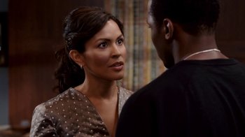 Movie still from “Madea Goes to Jail” (2009), directed by Tyler Perry – A woman talking to a man in front of a window; Close Up shot, Over the shoulder angle