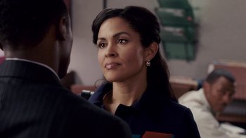 Movie still from “Madea Goes to Jail” (2009), directed by Tyler Perry – A woman in a blue shirt is talking to a man; Close Up shot, Over the shoulder angle