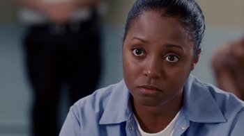 Movie still from “Madea Goes to Jail” (2009), directed by Tyler Perry – A person wearing a blue shirt; Close Up shot, High angle