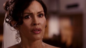 Movie still from “Madea Goes to Jail” (2009), directed by Tyler Perry – A woman's face looking at the camera; Close Up shot, Over the shoulder angle