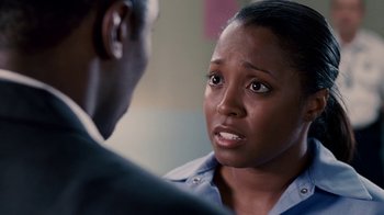 Movie still from “Madea Goes to Jail” (2009), directed by Tyler Perry – An african american woman talking to a black man; Close Up shot, Over the shoulder angle