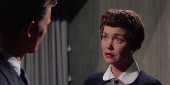 Movie still from “Magnificent Obsession” (1954), directed by Douglas Sirk – A man and a woman talking to each other; Close Up shot, Over the shoulder angle