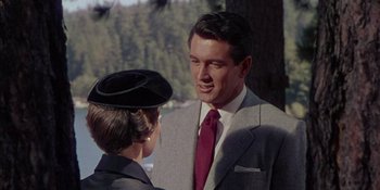 Movie still from “Magnificent Obsession” (1954), directed by Douglas Sirk – A man and a woman talking to each other; Medium shot, Over the shoulder angle