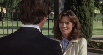 Movie still from “Making Love” (1982), directed by Arthur Hiller – A man and a woman talking to each other outside; Close Up shot, Over the shoulder angle