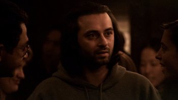 Movie still from “Man Push Cart” (2005), directed by Ramin Bahrani – A person with long hair; Close Up shot, Over the shoulder angle