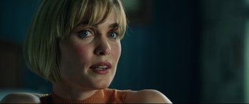 Movie still from “Man on Fire” (2004), directed by Tony Scott – A person with blue eyes; Close Up shot, Over the shoulder angle