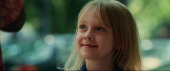 Movie still from “Man on Fire” (2004), directed by Tony Scott – A young girl's face; Close Up shot, Over the shoulder angle