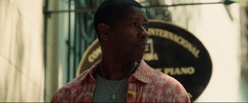 Movie still from “Man on Fire” (2004), directed by Tony Scott – A person wearing a shirt; Close Up shot, Low angle