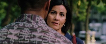 Movie still from “Man on Fire” (2004), directed by Tony Scott – A person talking to another person; Close Up shot, Over the shoulder angle