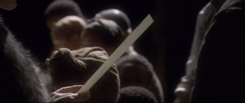 Movie still from “Manderlay” (2005), directed by Lars von Trier – A person holding a white stick; Close Up shot, Low angle