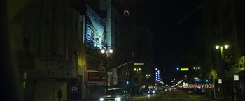 Movie still from “Maniac” (2012), directed by Franck Khalfoun – A city street at night lit up by street lights; Extreme Wide shot, Low angle