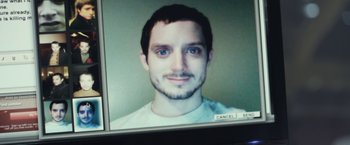 Movie still from “Maniac” (2012), directed by Franck Khalfoun – A man's face on a television screen; Close Up shot, High angle