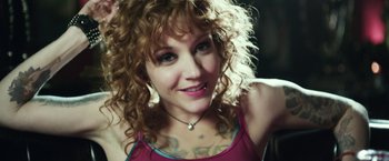 Movie still from “Maniac” (2012), directed by Franck Khalfoun – A person with curly red hair; Close Up shot, High angle