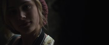 Movie still from “Maniac” (2012), directed by Franck Khalfoun – A person wearing a pink hat; Close Up shot, Over the shoulder angle