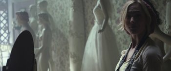 Movie still from “Maniac” (2012), directed by Franck Khalfoun – A woman wearing a wedding dress in front of a mirror; Close Up shot, Over the shoulder angle