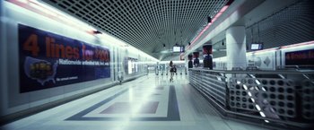 Movie still from “Maniac” (2012), directed by Franck Khalfoun – People are walking through a subway station; Extreme Wide shot, High angle
