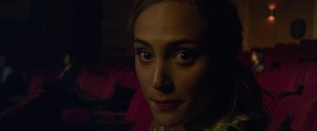 Movie still from “Maniac” (2012), directed by Franck Khalfoun – A woman's face in the dark; Close Up shot, High angle