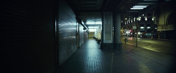 Movie still from “Maniac” (2012), directed by Franck Khalfoun – An alley way with a lot of closed doors; Extreme Wide shot, Low angle