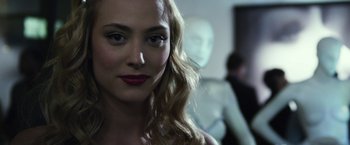Movie still from “Maniac” (2012), directed by Franck Khalfoun – A person wearing a red lipstick; Close Up shot, Over the shoulder angle